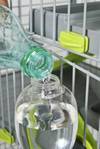 Biberon plastique vert pour lapin